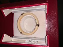 Bracelet signed Cartier Paris vintage 1970 gold and cream