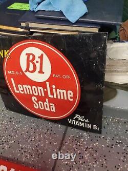 C. 1950s Original Vintage Drink B-1 Lemon Lime Soda Sign Metal Embossed Grocery