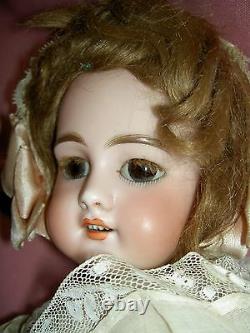 French antique bisque DEP 6 (Jumeau) doll, pierced ears, wood body, signed shoes