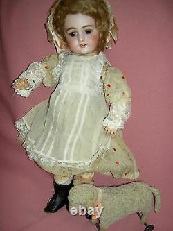 French antique bisque DEP 6 (Jumeau) doll, pierced ears, wood body, signed shoes