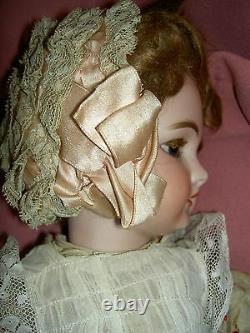 French antique bisque DEP 6 (Jumeau) doll, pierced ears, wood body, signed shoes