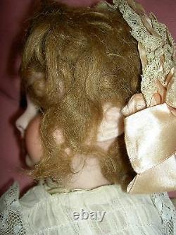 French antique bisque DEP 6 (Jumeau) doll, pierced ears, wood body, signed shoes