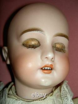 French antique bisque DEP 6 (Jumeau) doll, pierced ears, wood body, signed shoes