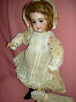 French antique bisque DEP 6 (Jumeau) doll, pierced ears, wood body, signed shoes