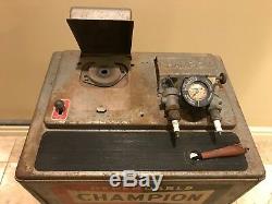 Old Vintage Champion Spark Plug Service Tester and Cleaner Station Sign on front