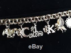 VINTAGE 14 k GOLD CHUNKY CHARM BRACELET ALL CHARMS ARE SIGNED 20 GRAMS