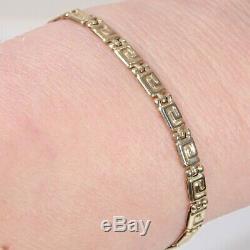 Vintage 14k yellow gold Greek key design bracelet, 7.5 long x 4 mm, signed L'do