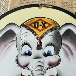 Vintage 1940 DX Lubricating Motor Fuel Dumbo 12 Inch Porcelain Enamel Sign