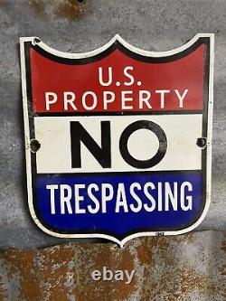Vintage 1962 US property NO TRESPASSING porcelain sign shield government Service