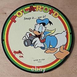 Vintage Art Polaroid Snap It Donald Duck Porcleain Gas Oil Mancave Pump Ad Sign
