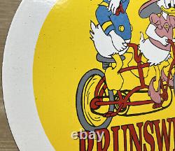 Vintage Brunswick Tires Porcelain Sign Gas Station Disney Donald Duck Bicycle
