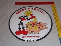 Vintage Reddy Kilowatt Piggy Bank Saves $$ 11 3/4 Porcelain Metal Gasoline Sign