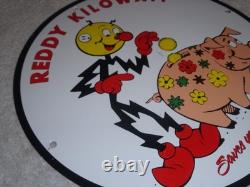 Vintage Reddy Kilowatt Piggy Bank Saves $$ 11 3/4 Porcelain Metal Gasoline Sign