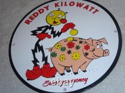 Vintage Reddy Kilowatt Piggy Bank Saves $$ 11 3/4 Porcelain Metal Gasoline Sign