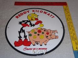 Vintage Reddy Kilowatt Piggy Bank Saves $$ 11 3/4 Porcelain Metal Gasoline Sign
