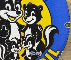 Vintage Skunk Oil Porcelain Sign Heavy Duty Dealership Gas Station Motor Oil