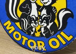 Vintage Skunk Oil Porcelain Sign Heavy Duty Dealership Gas Station Motor Oil