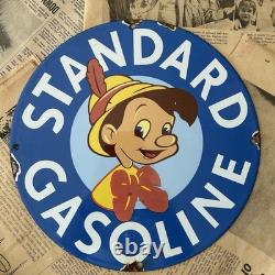 Vintage Standard Gasoline Pinocchio Walt Disney 12 Inch Porcelain Enamel Sign