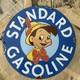 Vintage Standard Gasoline Pinocchio Walt Disney 12 Inch Porcelain Enamel Sign