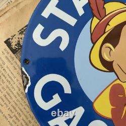 Vintage Standard Gasoline Pinocchio Walt Disney 12 Inch Porcelain Enamel Sign
