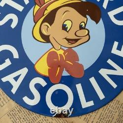 Vintage Standard Gasoline Pinocchio Walt Disney 12 Inch Porcelain Enamel Sign