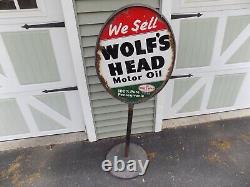 Vintage We Sell Wolf's Head Motor Oil Double Sided Lollipop Sign