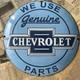 Vintage We Use Genuine Chevrolet Parts 12 Inch Convex Porcelain Enamel Sign