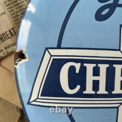Vintage We Use Genuine Chevrolet Parts 12 Inch Convex Porcelain Enamel Sign