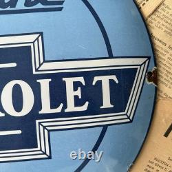 Vintage We Use Genuine Chevrolet Parts 12 Inch Convex Porcelain Enamel Sign